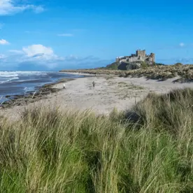 people on Bamburgh Beach