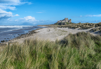 people on Bamburgh Beach