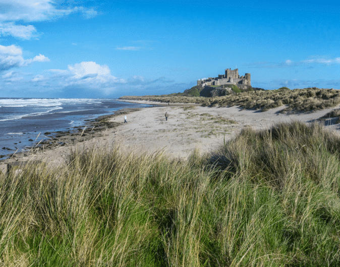 people on Bamburgh Beach