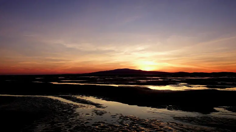 Queensberry Bay beach sunset