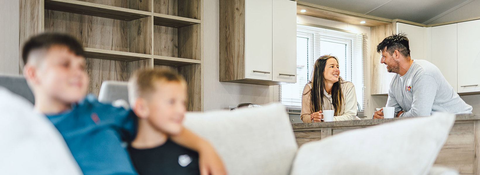 Family relaxing in a lodge on holiday 