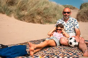 Dad and daughter on Irvine beach