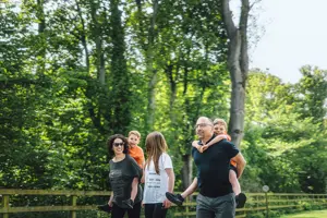 Family walking at a UK holiday park 