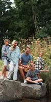 Family by the River at riverside Holiday Park
