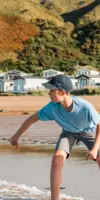 Boy at Pease Bay beach