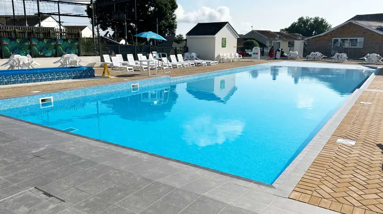 Outdoor swimming pool at Golden Coast 
