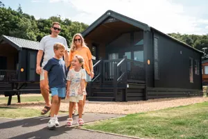 Family leaving accommodation at Thurston Manor