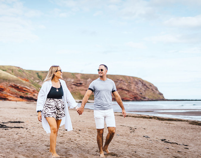 Couple on Pease Bay beach