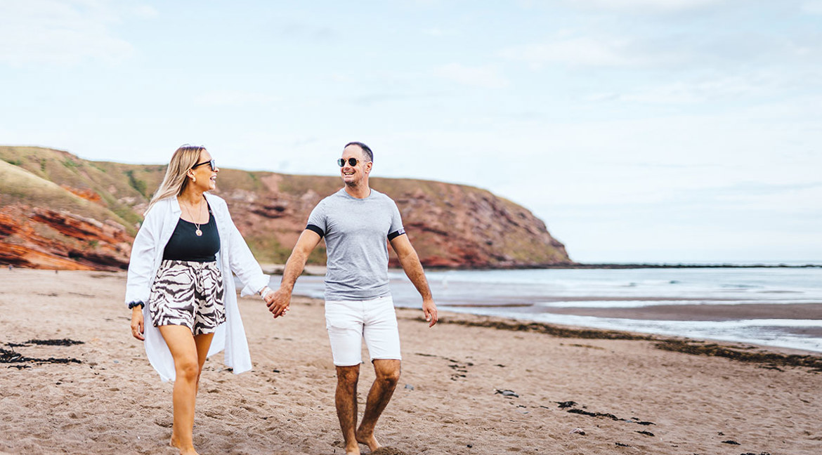Couple on Pease Bay beach