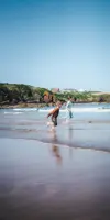 Children in the sea at Coldingham Beach near Scoutscroft 